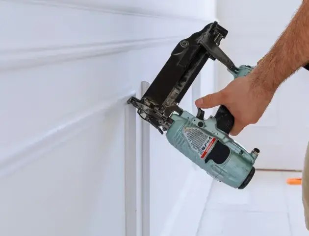 midsection-man-drilling-wall_1048944-5238077